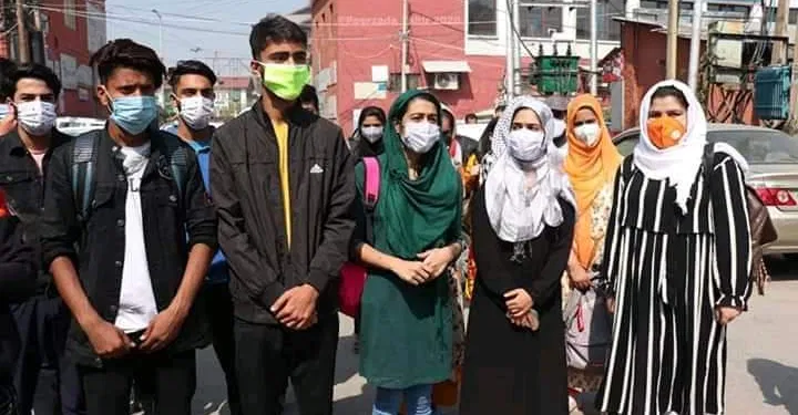 Demanding mass promotion, 11th class students hold protest