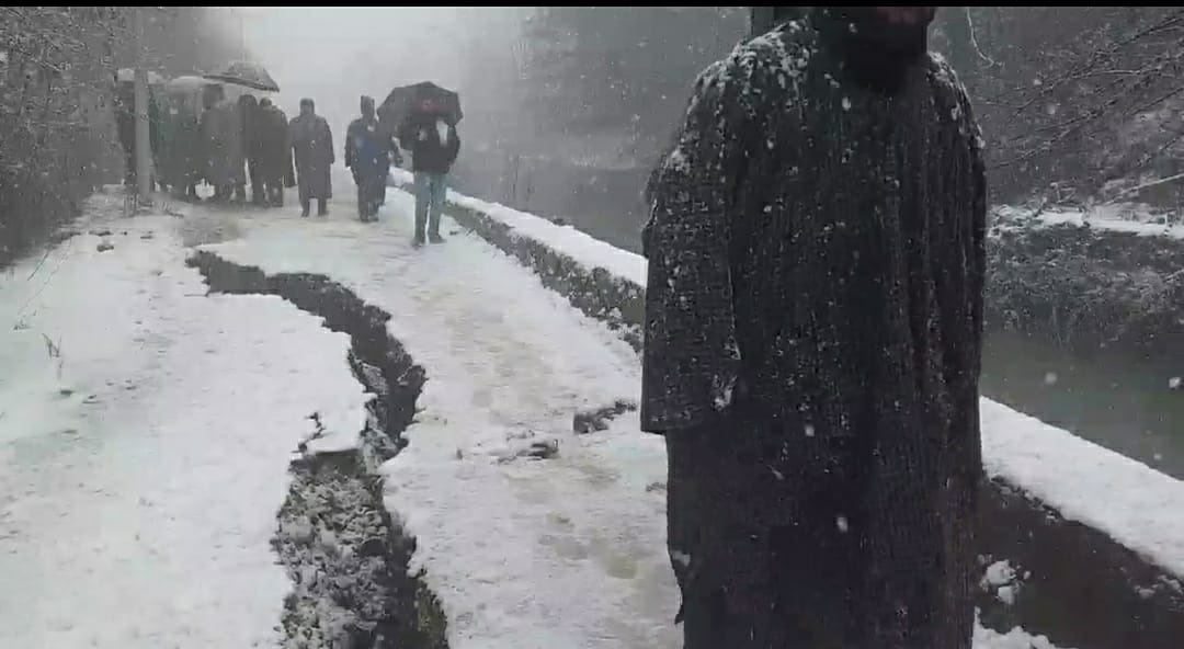 Major cracks develop in Power Canal road near Hi-tech Forest Nursery Badrgund Ganderbal